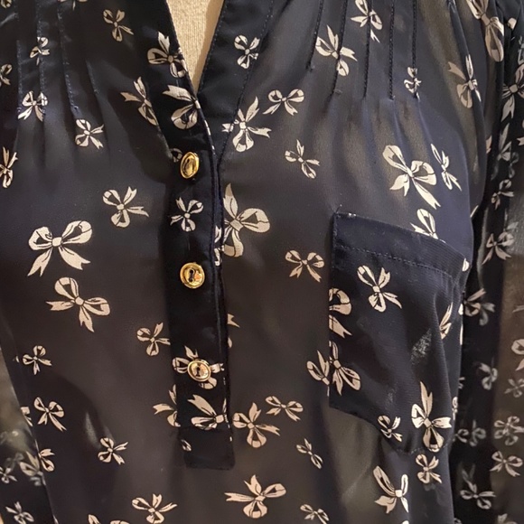 Navy and with white bows printed on shear fabric. Size M juniors - Picture 4 of 11